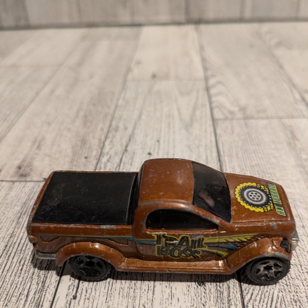Hot Wheels Orange Die-Cast Pickup Truck Toy with Graphic Decals